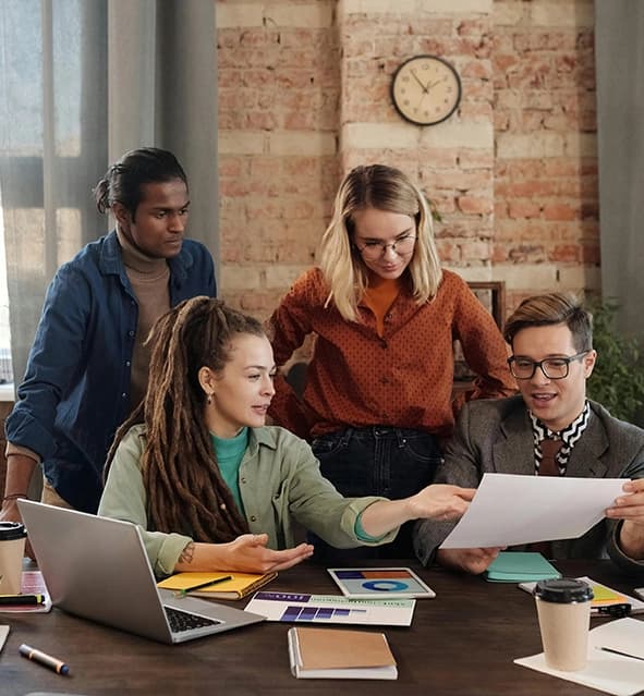 Team of professionals collaborating in the Computyne office